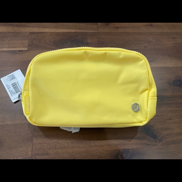 lululemon athletica Handbags - LULULEMON NWT yellow belt bag!!!